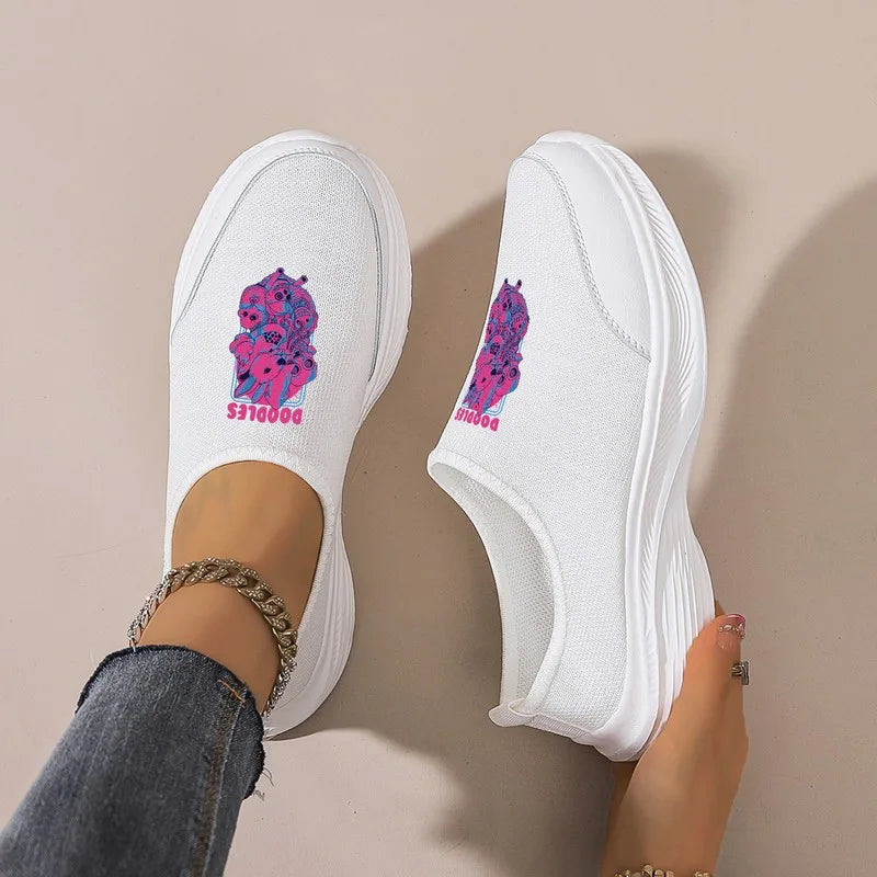 Women's Black Slip-On Sneakers: Platform Wedge Sole, Casual Comfort. Trendy Graphic Mesh Shoes for Daily & Commute Wear.