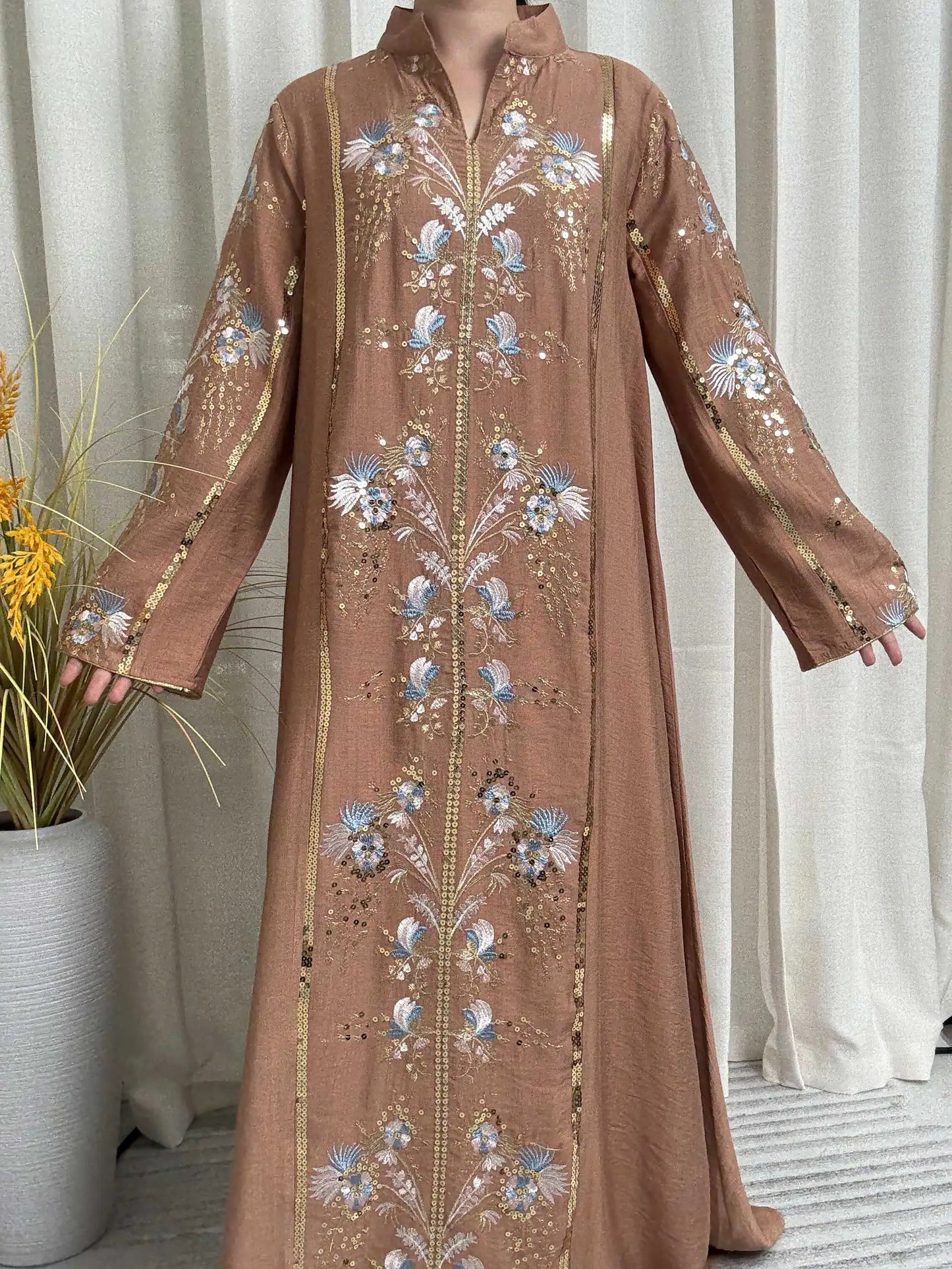 Trendy Black Islamic Dress with Distinctive Neck Design and Gorgeous Embroidered Details for Modern Muslim Women's Occasions