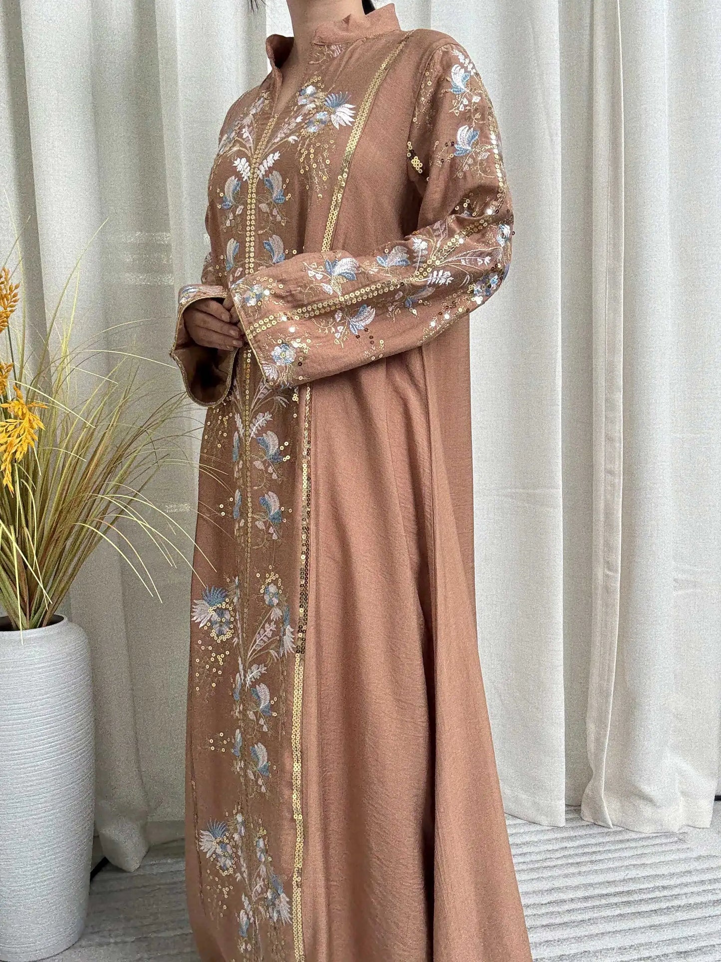Trendy Black Islamic Dress with Distinctive Neck Design and Gorgeous Embroidered Details for Modern Muslim Women's Occasions