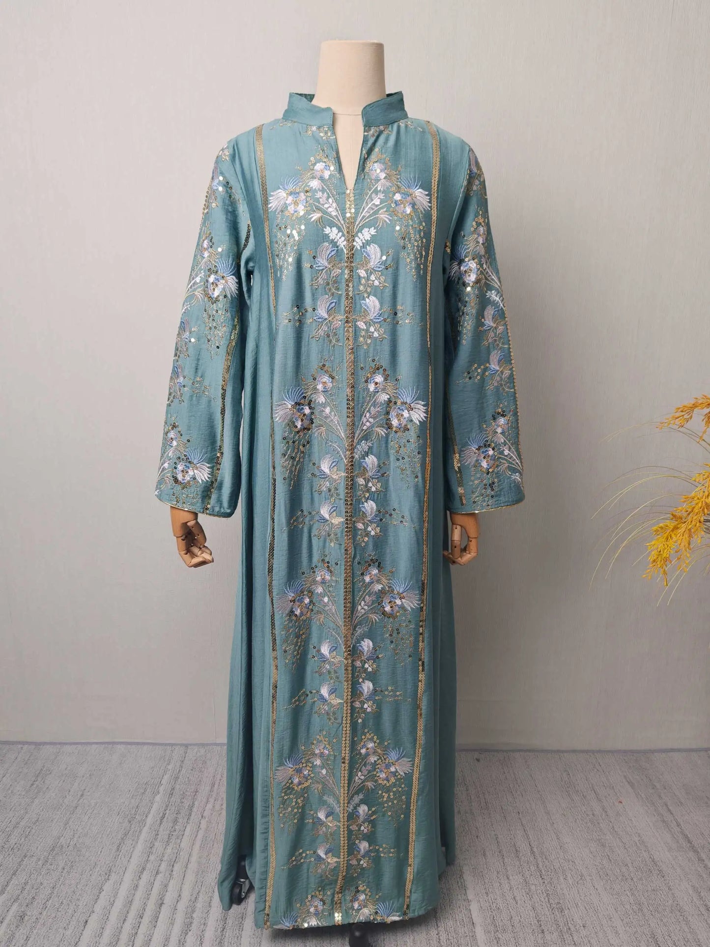 Trendy Black Islamic Dress with Distinctive Neck Design and Gorgeous Embroidered Details for Modern Muslim Women's Occasions