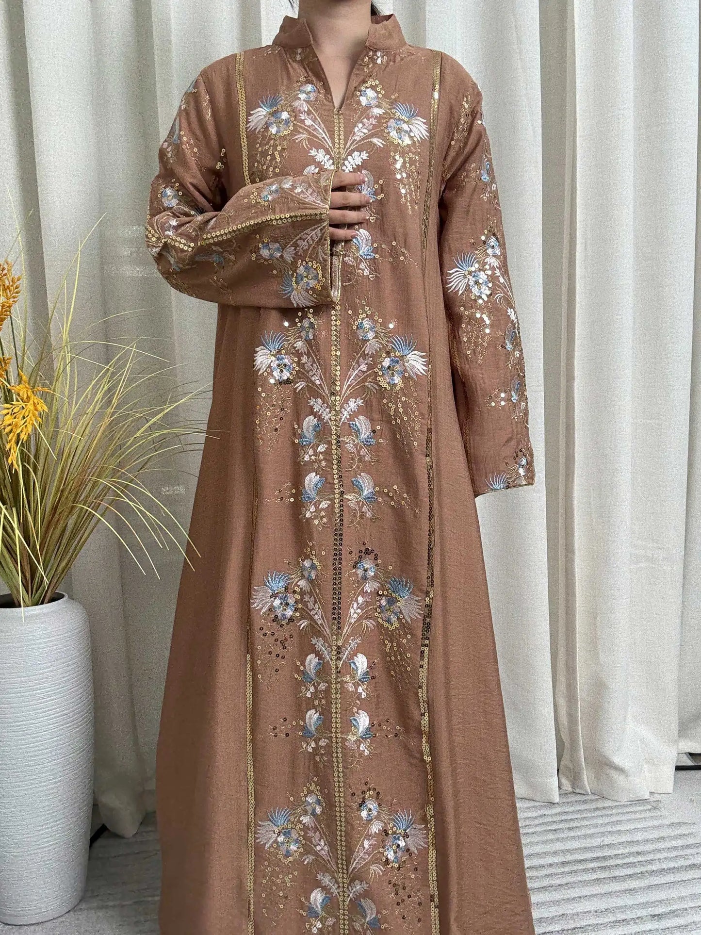 Trendy Black Islamic Dress with Distinctive Neck Design and Gorgeous Embroidered Details for Modern Muslim Women's Occasions