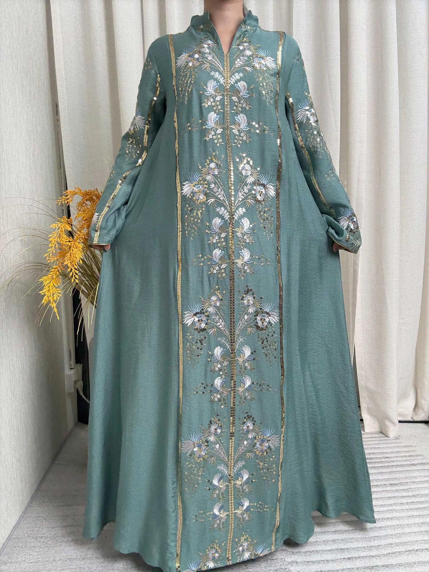 Trendy Black Islamic Dress with Distinctive Neck Design and Gorgeous Embroidered Details for Modern Muslim Women's Occasions