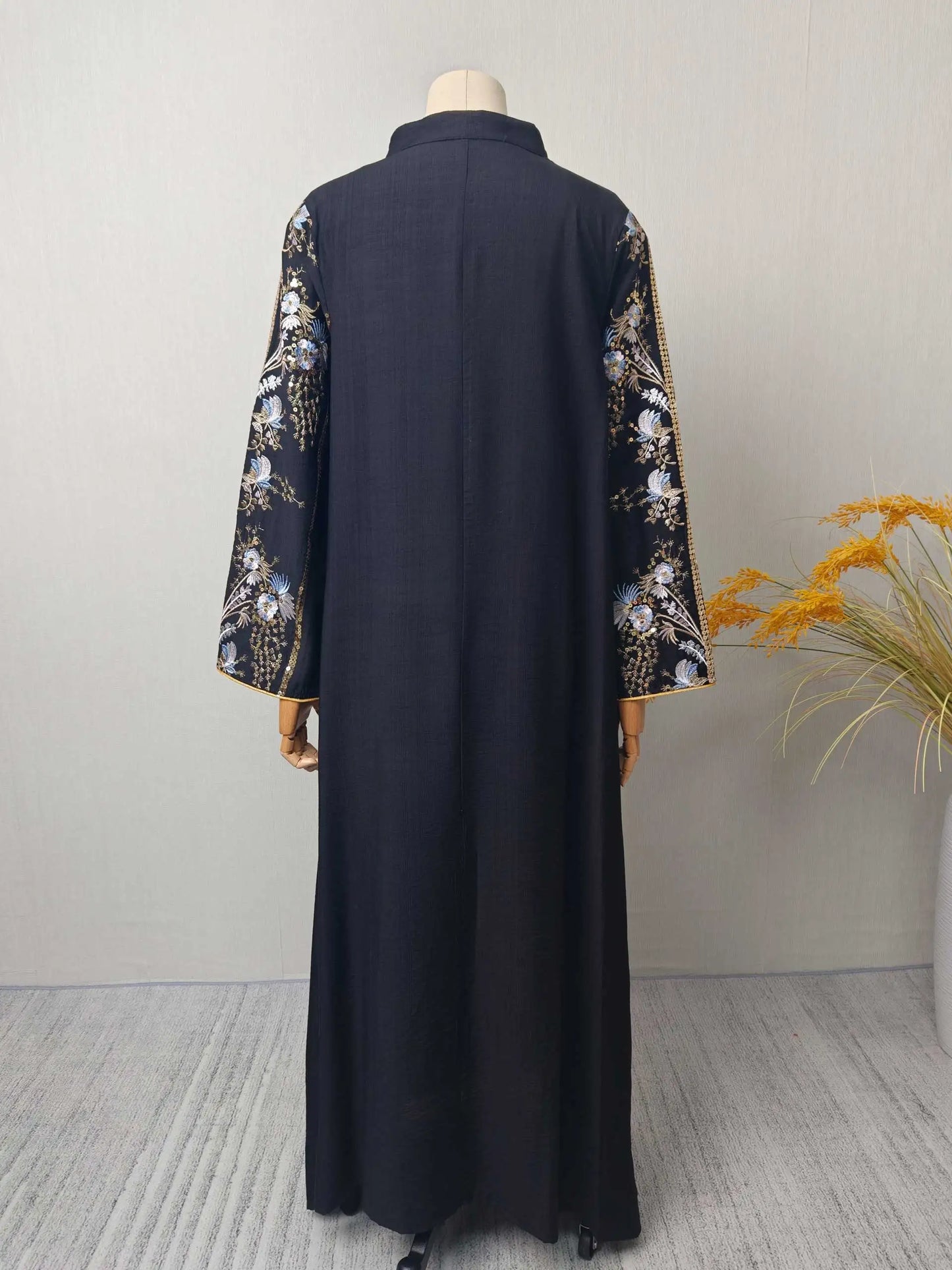 Trendy Black Islamic Dress with Distinctive Neck Design and Gorgeous Embroidered Details for Modern Muslim Women's Occasions
