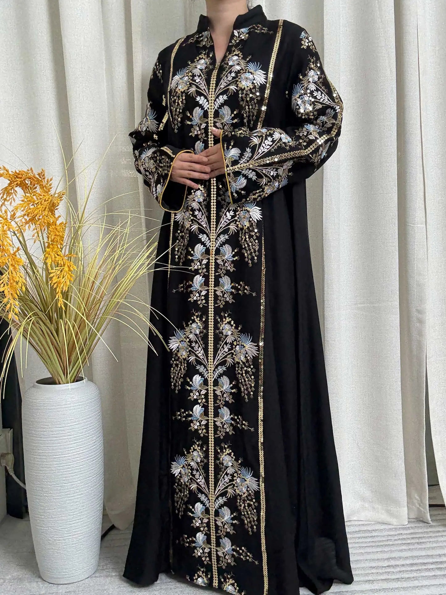 Trendy Black Islamic Dress with Distinctive Neck Design and Gorgeous Embroidered Details for Modern Muslim Women's Occasions
