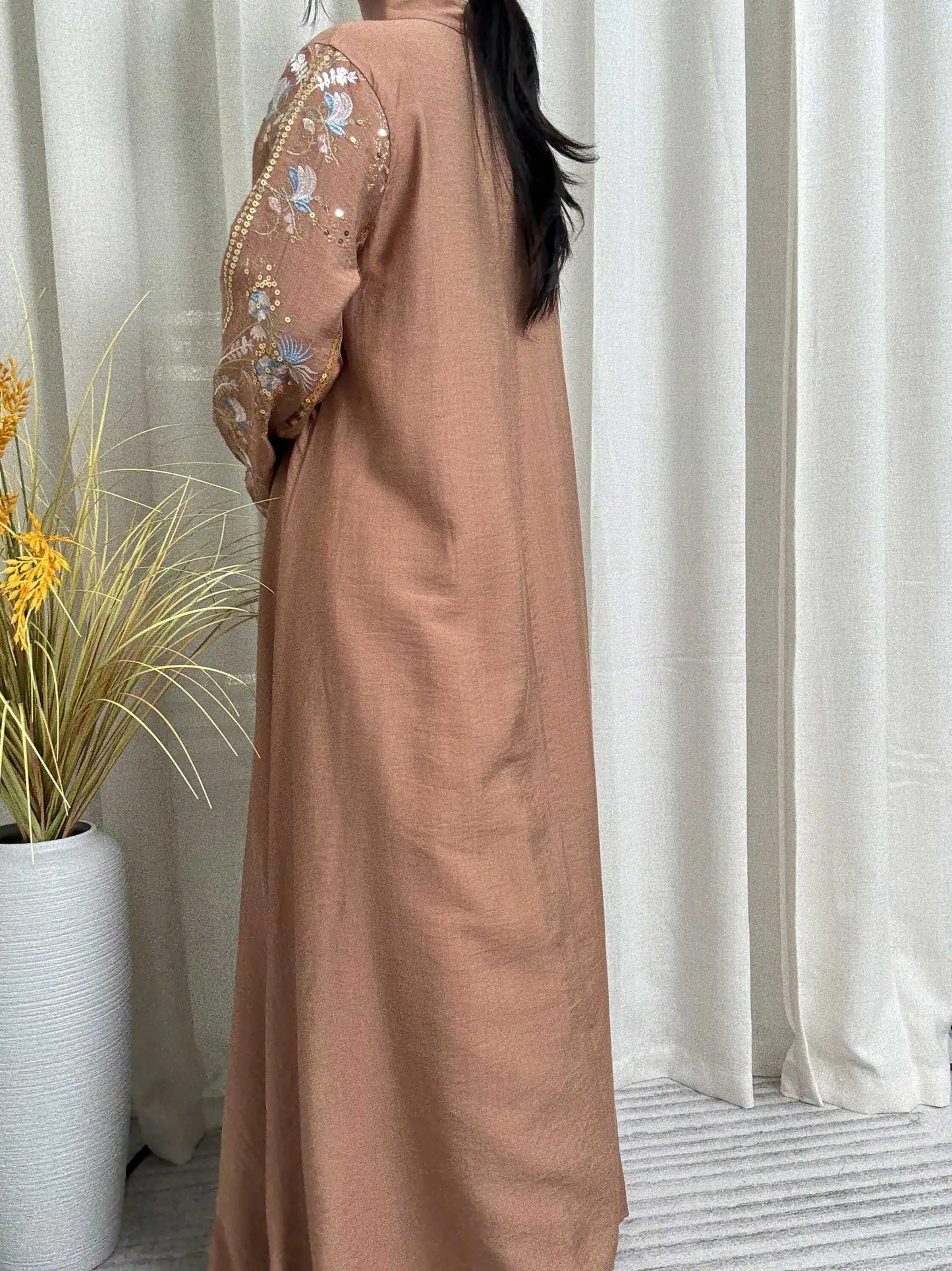 Trendy Black Islamic Dress with Distinctive Neck Design and Gorgeous Embroidered Details for Modern Muslim Women's Occasions