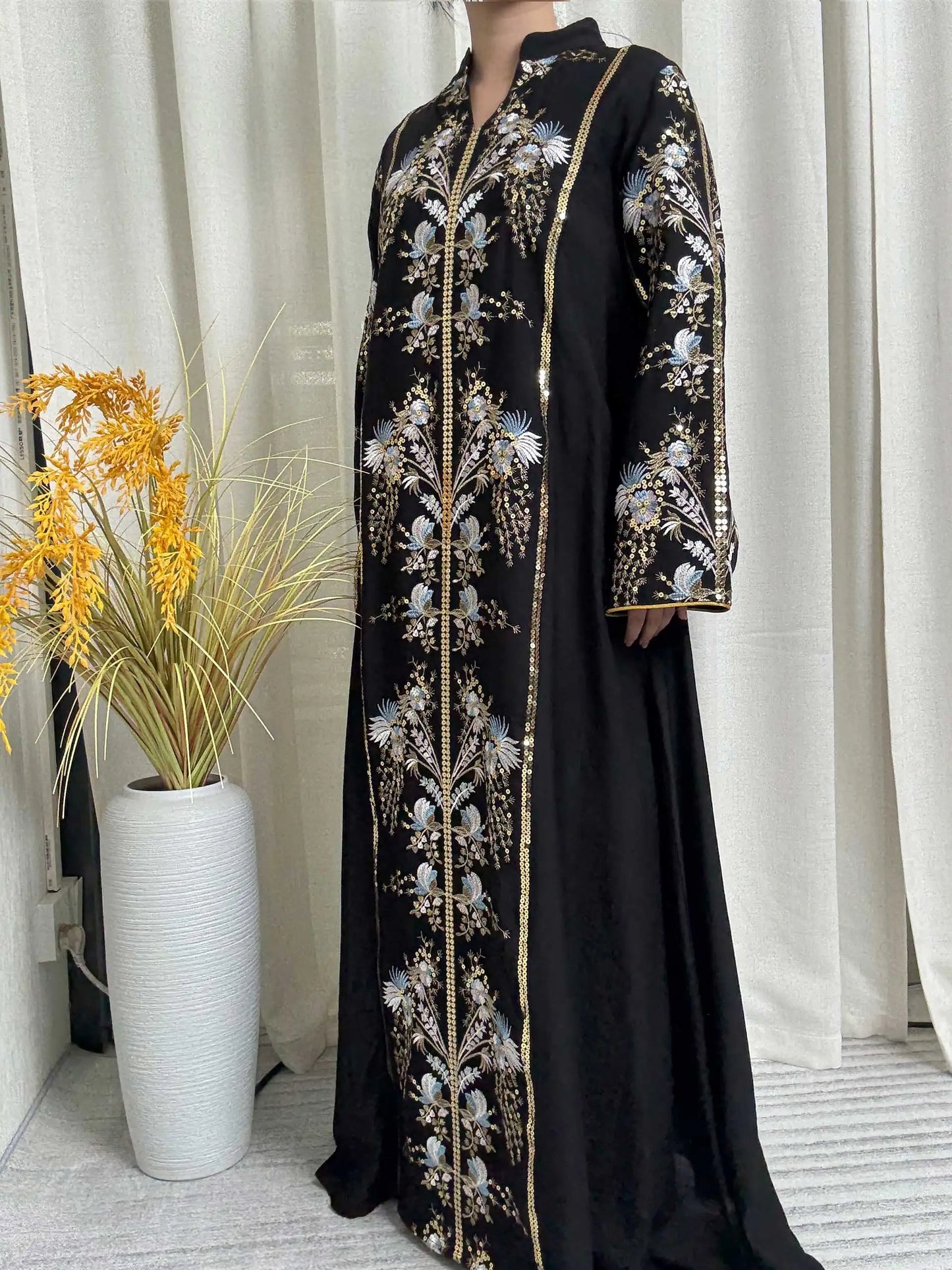 Trendy Black Islamic Dress with Distinctive Neck Design and Gorgeous Embroidered Details for Modern Muslim Women's Occasions