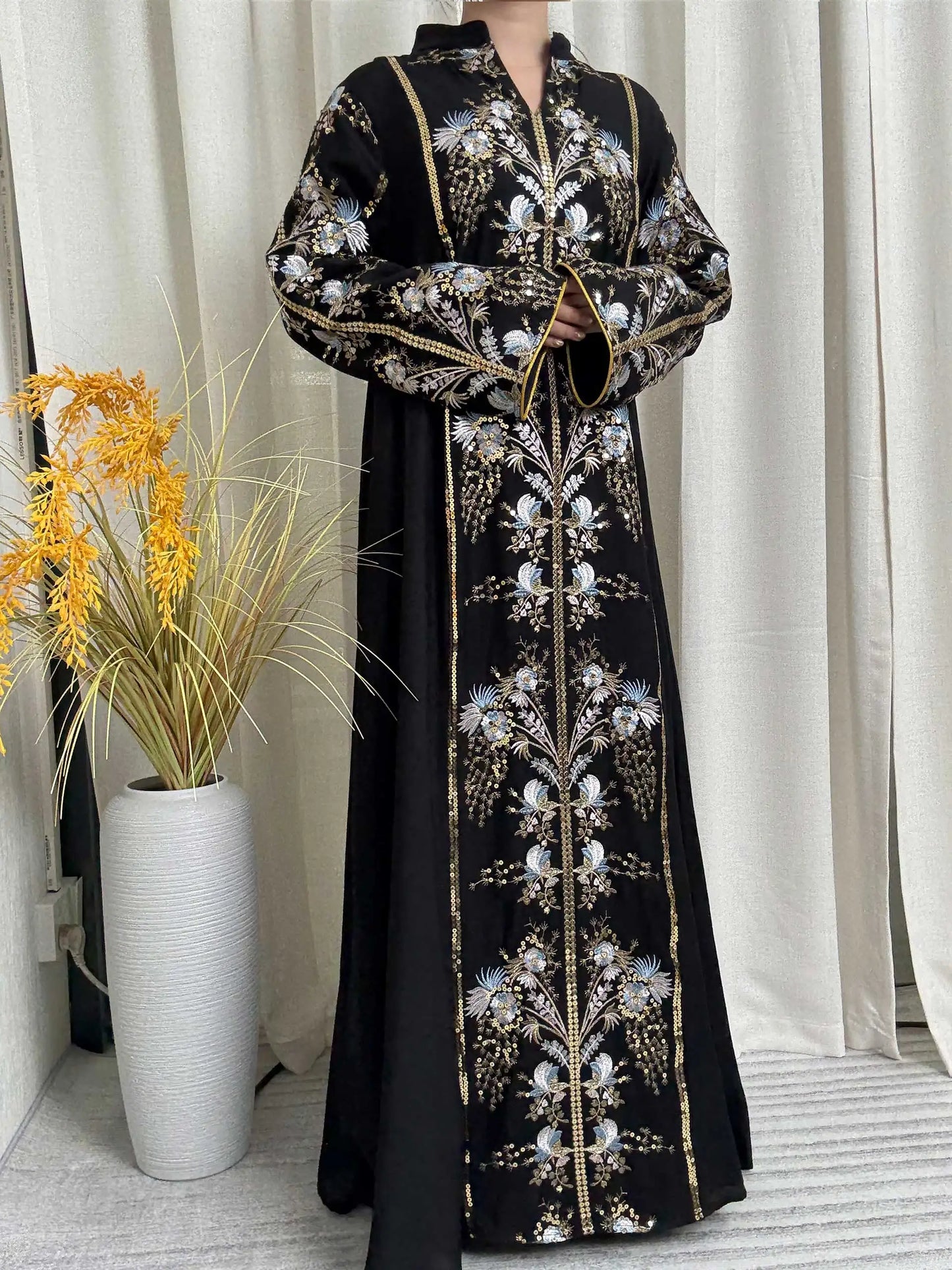 Trendy Black Islamic Dress with Distinctive Neck Design and Gorgeous Embroidered Details for Modern Muslim Women's Occasions