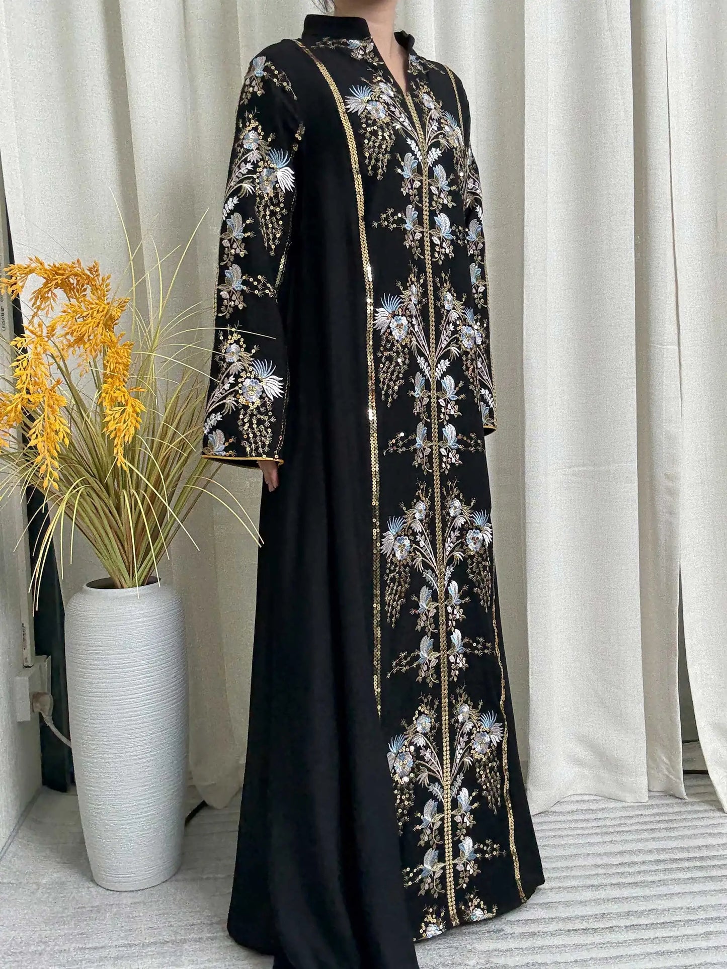 Trendy Black Islamic Dress with Distinctive Neck Design and Gorgeous Embroidered Details for Modern Muslim Women's Occasions