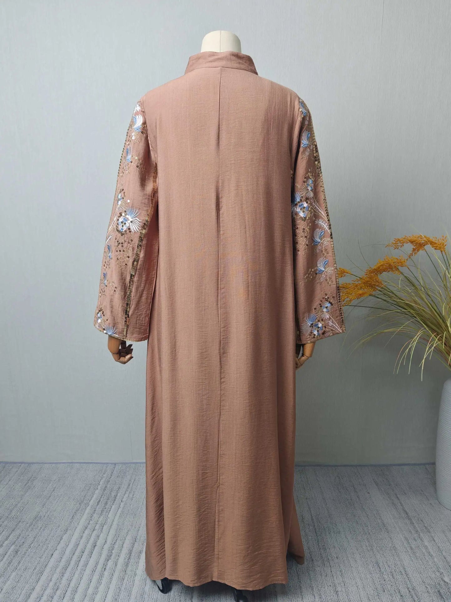 Trendy Black Islamic Dress with Distinctive Neck Design and Gorgeous Embroidered Details for Modern Muslim Women's Occasions