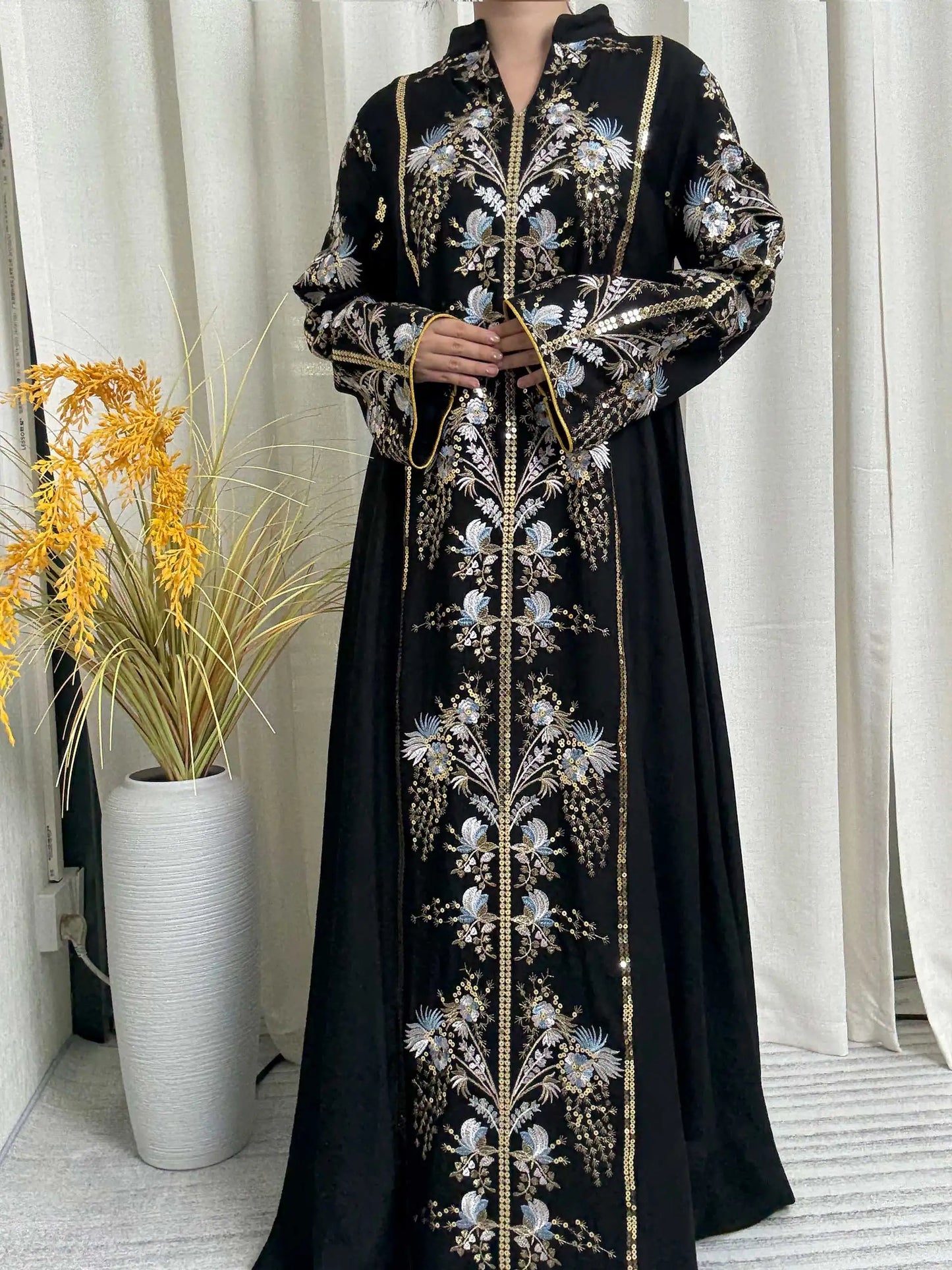 Trendy Black Islamic Dress with Distinctive Neck Design and Gorgeous Embroidered Details for Modern Muslim Women's Occasions