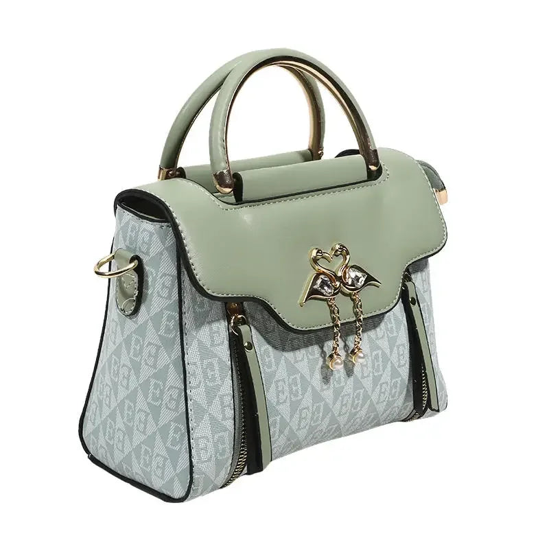 Ladies' handbag 2026 new fashion trend embossed plain style versatile casual shoulder crossbody bag.