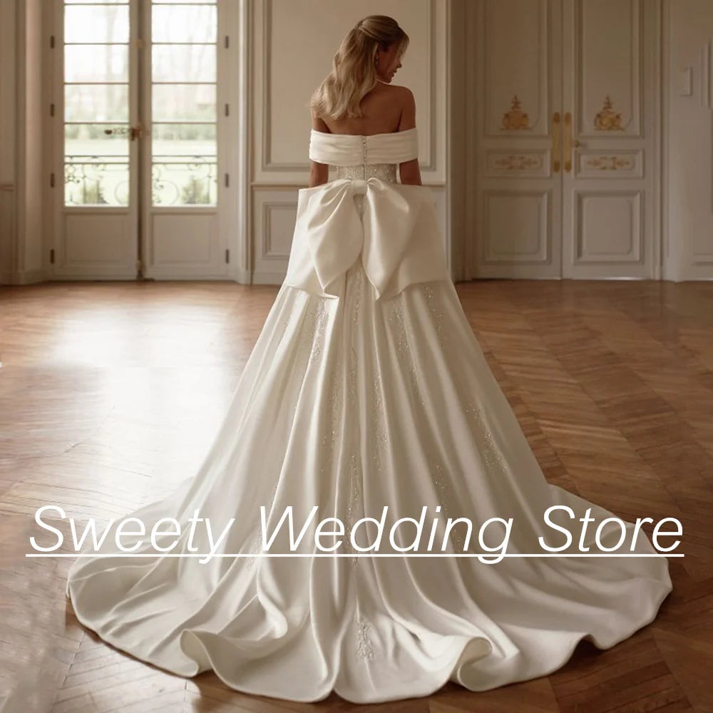 2025 Wedding Dress Vestido De Noiva Customized Boat Neck Off Shoulder Beading Applique Sweep Train Arabian Bridal Gown with Bow