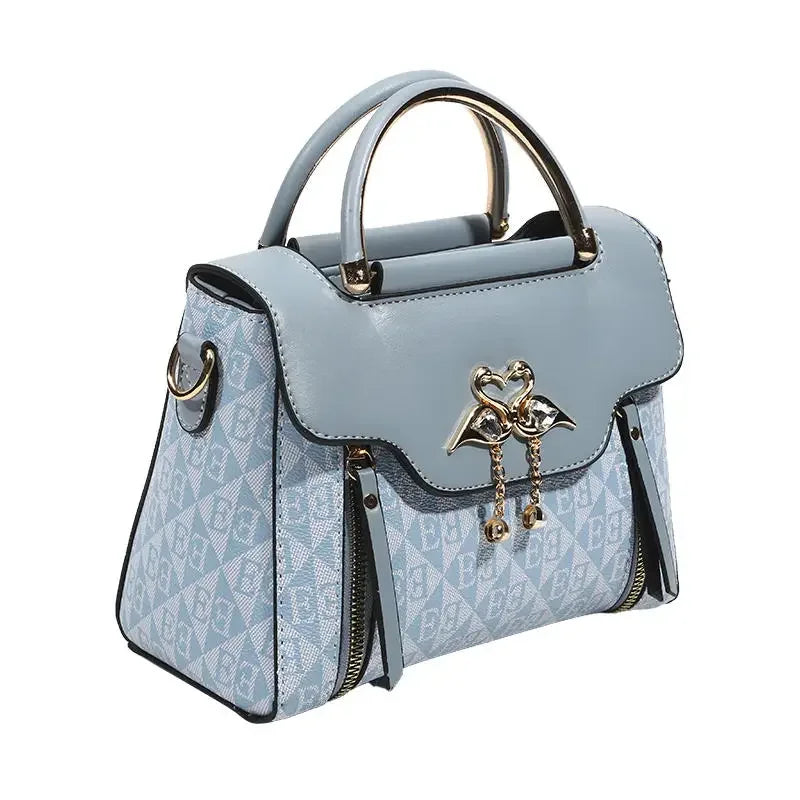 Ladies' handbag 2026 new fashion trend embossed plain style versatile casual shoulder crossbody bag.