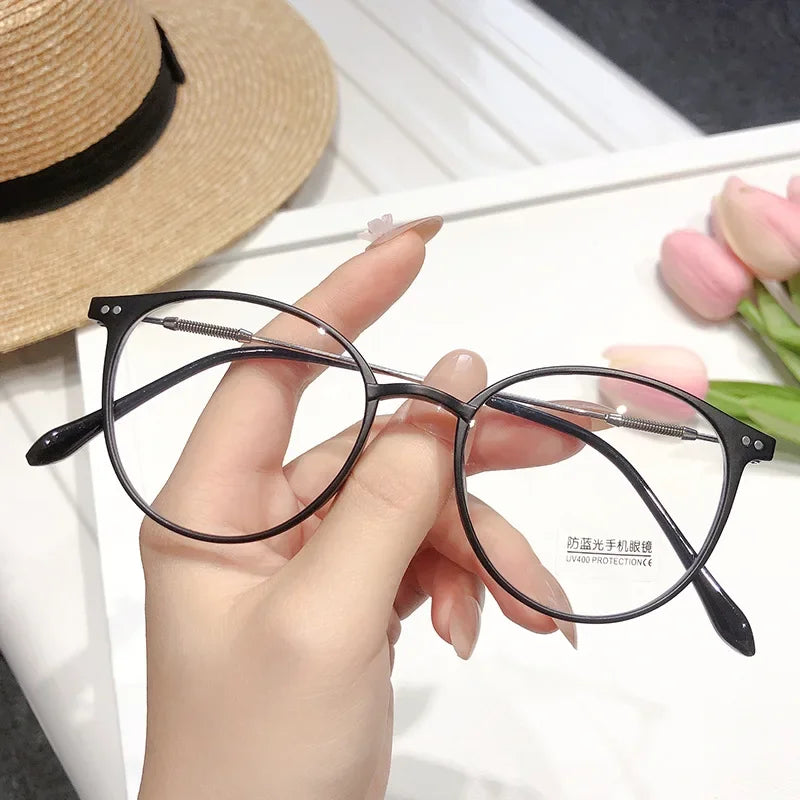 New TR90 Myopia Frames for Men and Women Retro Oval Spring Leg Optical Frames Fashion Hot Sale Glasses Frames Wholesale