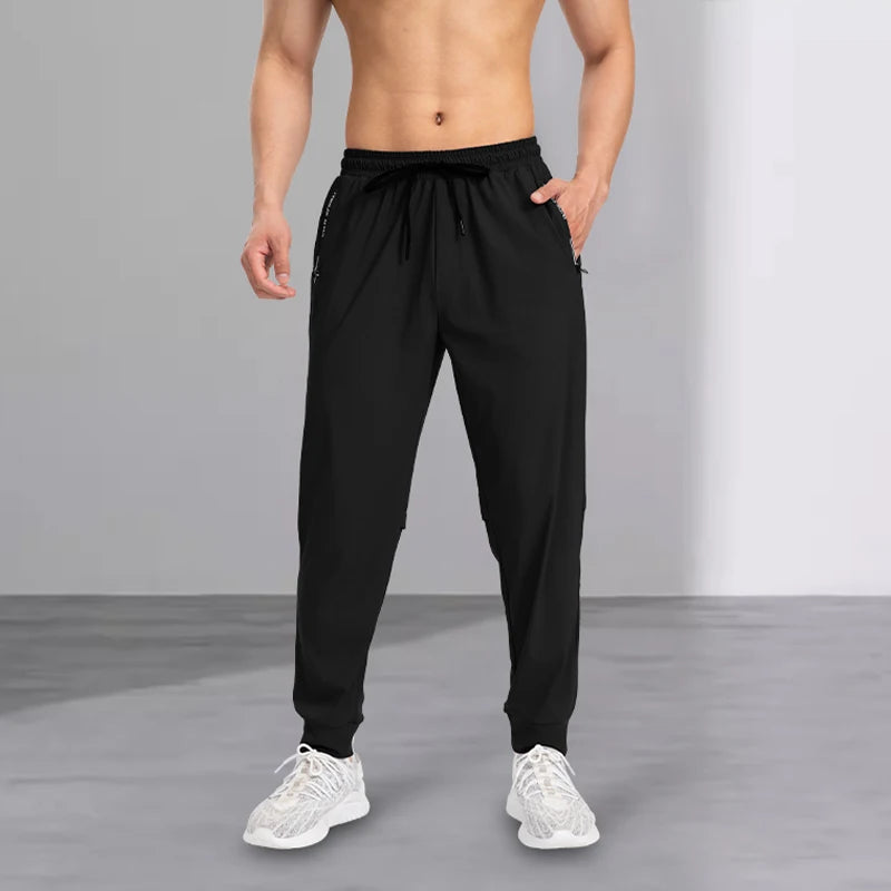 2025 new men's casual pants, spring and autumn sports pants, tight-fitting men's pants, loose and versatile long pants