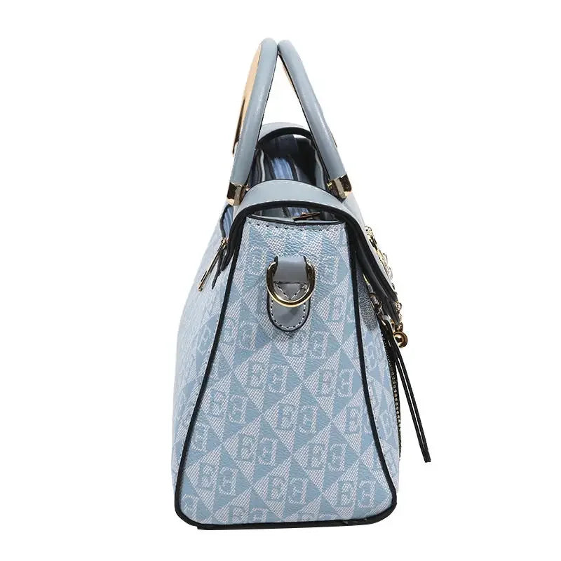 Ladies' handbag 2026 new fashion trend embossed plain style versatile casual shoulder crossbody bag.