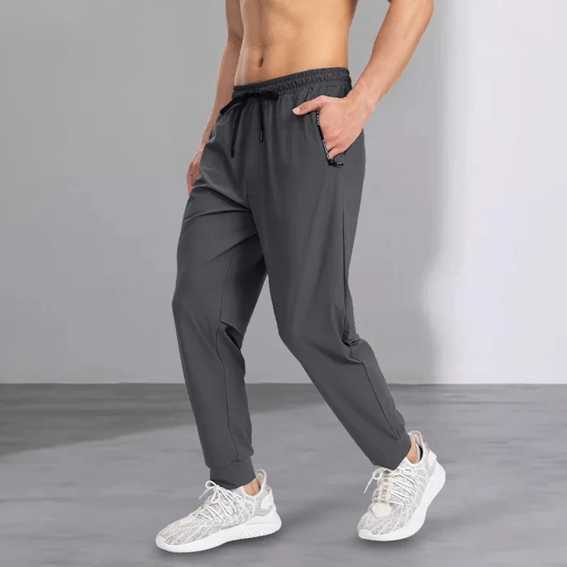 2025 new men's casual pants, spring and autumn sports pants, tight-fitting men's pants, loose and versatile long pants