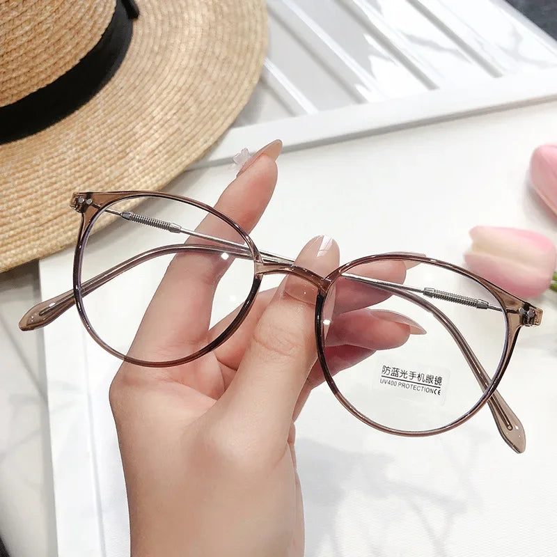 New TR90 Myopia Frames for Men and Women Retro Oval Spring Leg Optical Frames Fashion Hot Sale Glasses Frames Wholesale