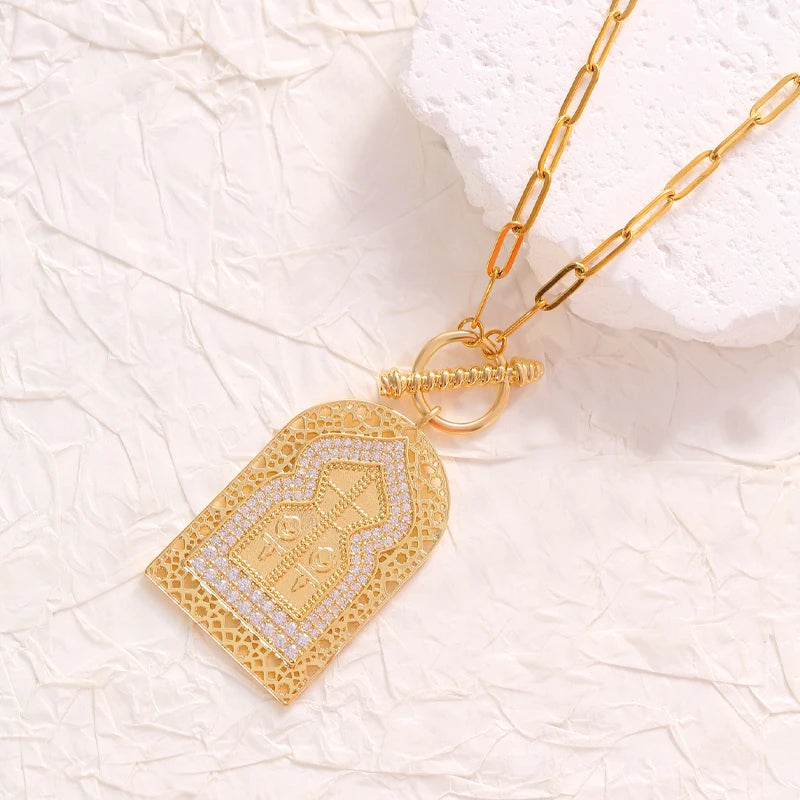 A pendant necklace with a fashionable geometric door-shaped design, featuring a stainless steel chain and set with zircons.