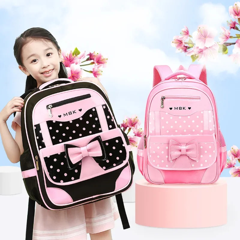 Lightweight School Backpack for Girls Kids Ages 6-12, Cute Polka Dot Bow Elementary Bookbag with Ergonomic Padded Straps