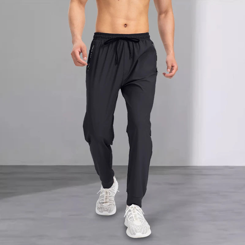 2025 new men's casual pants, spring and autumn sports pants, tight-fitting men's pants, loose and versatile long pants