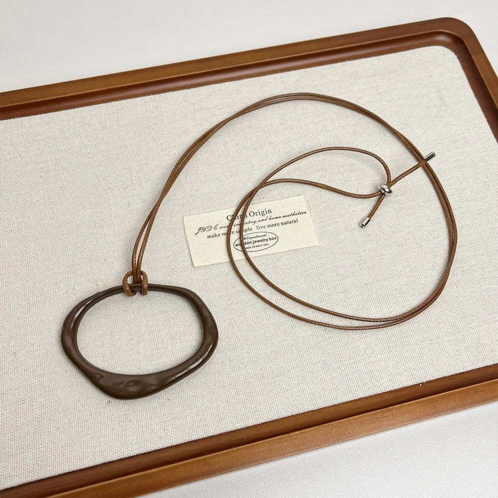 Long Adjustable Women's Necklace with Simple Geometric Irregular Pendant Design Sensation Minimalist Leather Rope Accessory