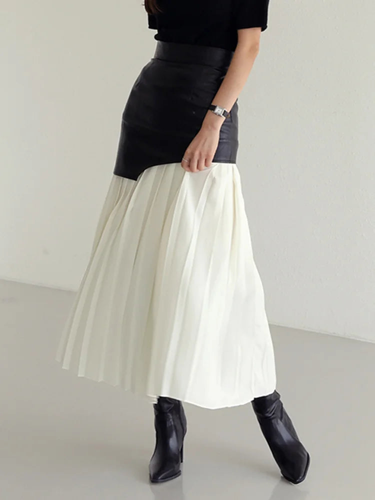 TWOTWINSTYLE Casual Patchwork Pu Skirt For Women High Waist Midi Folds Pleated Skirts Female 2022 Spring Fashion Clothing Style