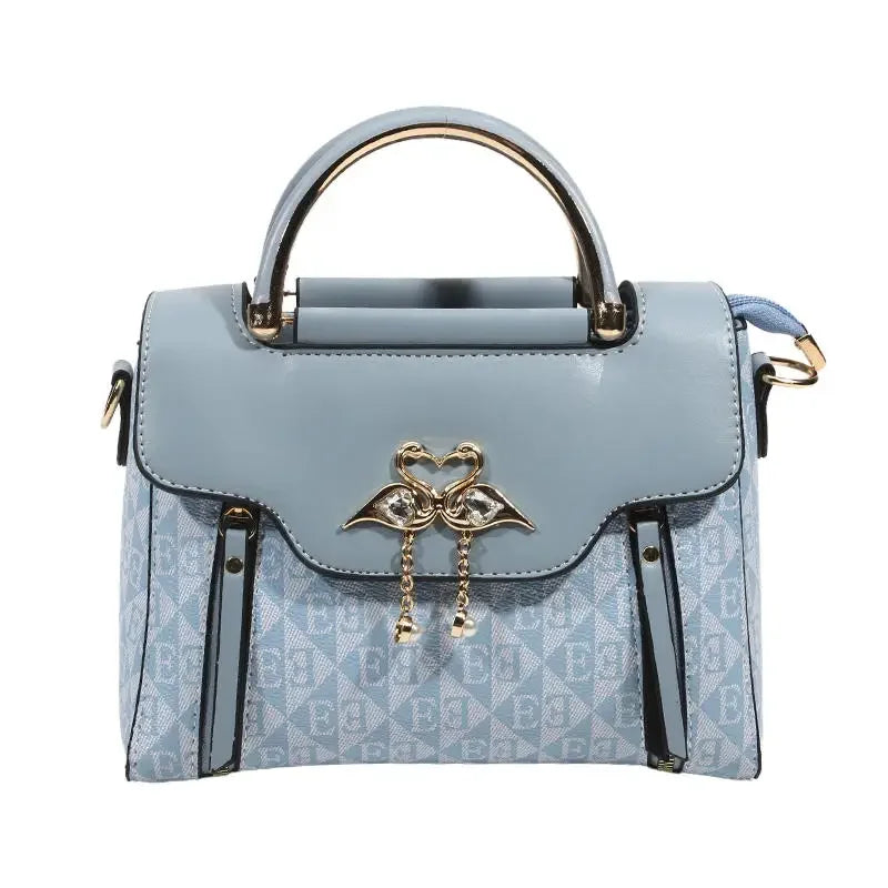 Ladies' handbag 2026 new fashion trend embossed plain style versatile casual shoulder crossbody bag.