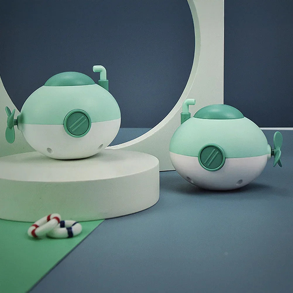 Baby takes a bath and plays in the water, Submarine, winding up animal chain, playing in the bathroom, children's toys