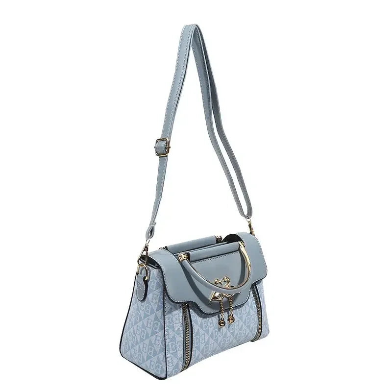 Ladies' handbag 2026 new fashion trend embossed plain style versatile casual shoulder crossbody bag.