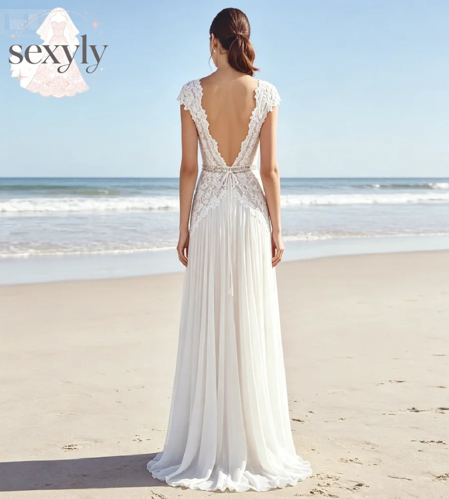 Ethereal Bohemian Wedding Dress 2026  V Neck Cap Sleeve Lace Chiffon A‑Line Bridal Gown Rhinestone Sash Boho Fairy Beach Bride