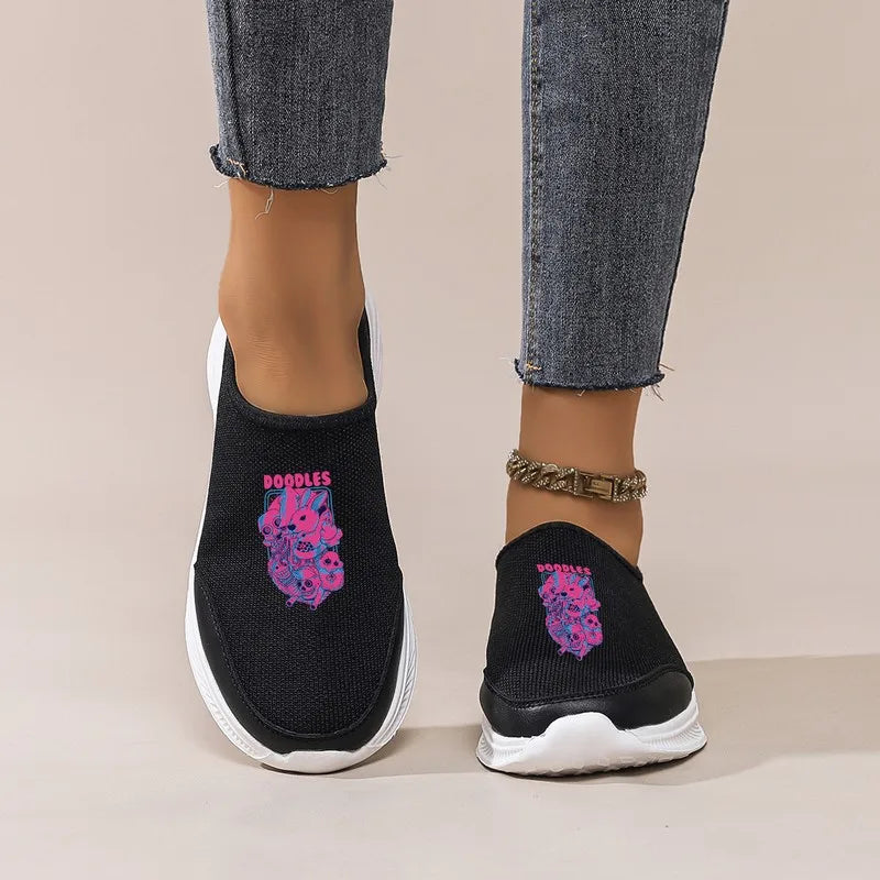 Women's Black Slip-On Sneakers: Platform Wedge Sole, Casual Comfort. Trendy Graphic Mesh Shoes for Daily & Commute Wear.