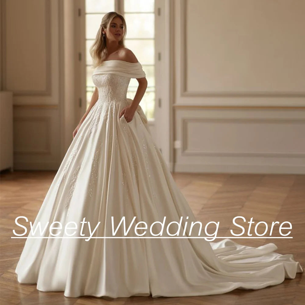 2025 Wedding Dress Vestido De Noiva Customized Boat Neck Off Shoulder Beading Applique Sweep Train Arabian Bridal Gown with Bow