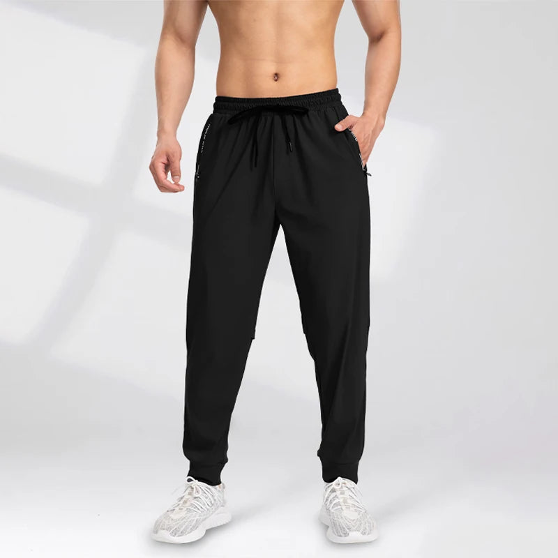 2025 new men's casual pants, spring and autumn sports pants, tight-fitting men's pants, loose and versatile long pants
