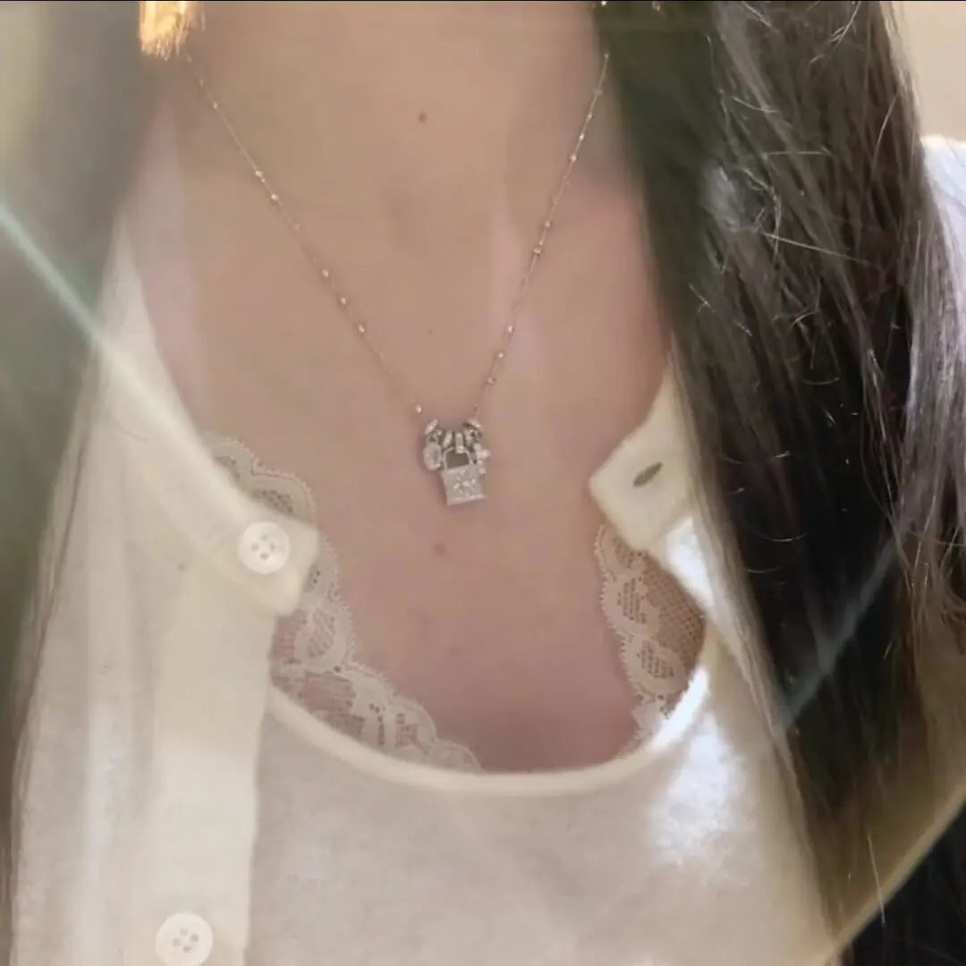 Lace craft running ring cross pendant lock bag necklace luxury premium feel collarbone chain niche new sweater chain