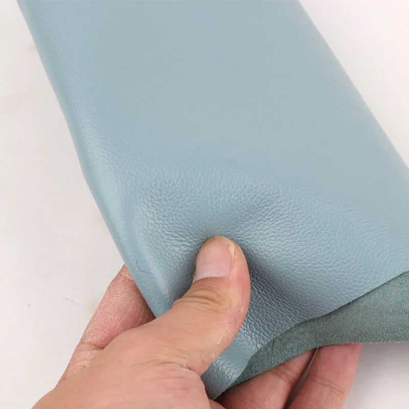 1.5mm thick first-layer cowhide leather material, light blue litchi pattern sofa seat cushion and table mat, leather fabric