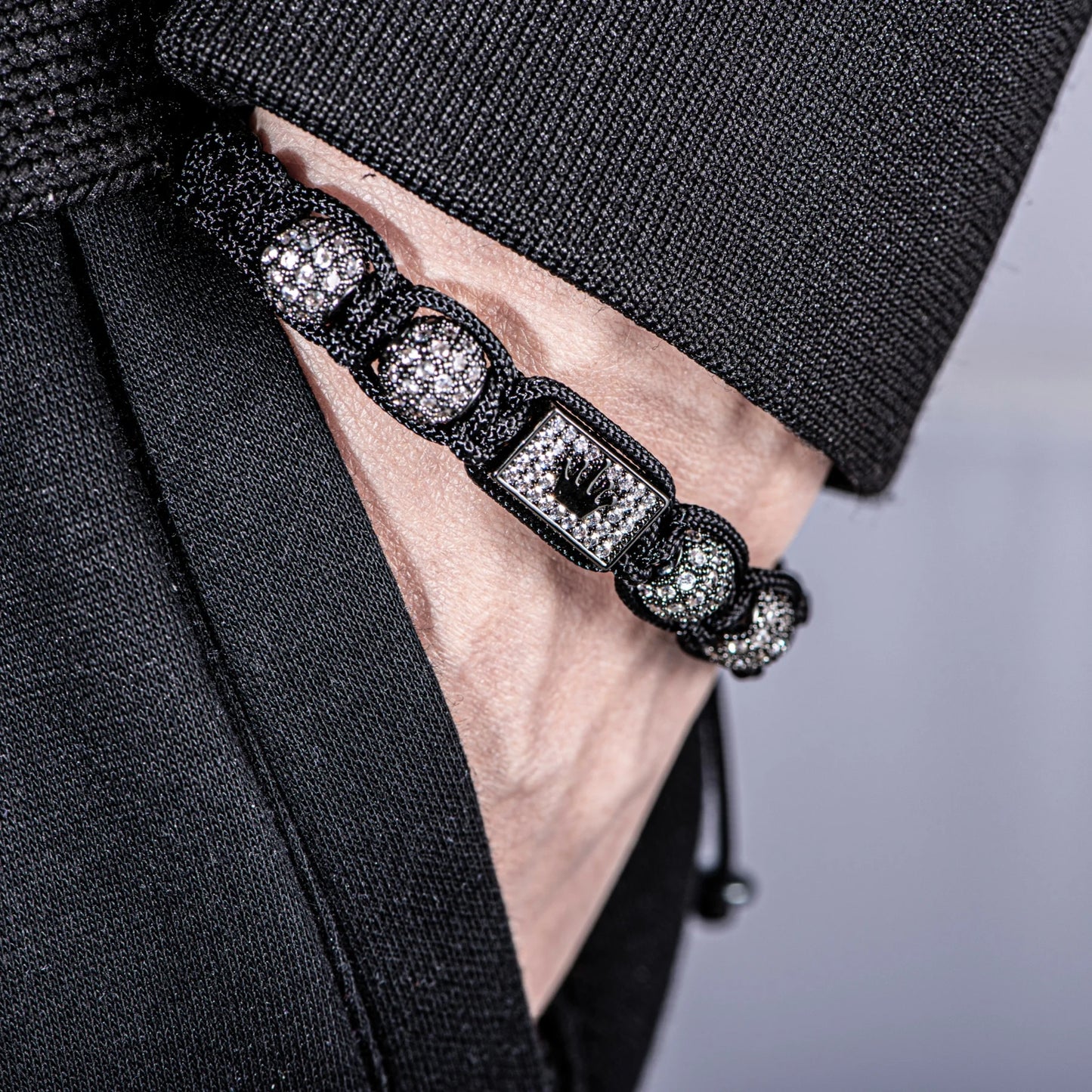 New Men's Adjustable Black Braided Crown Design Bracelet with Sparkling Synthetic Zirconia Stones Elegant GoldenTone Rectangular