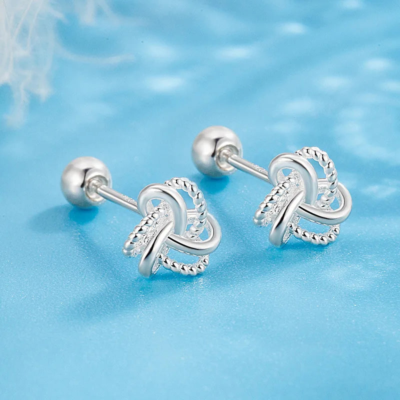 The S925 sterling silver stud earrings symbolize peace and good luck, representing high-end jewelry and a luxurious retro style