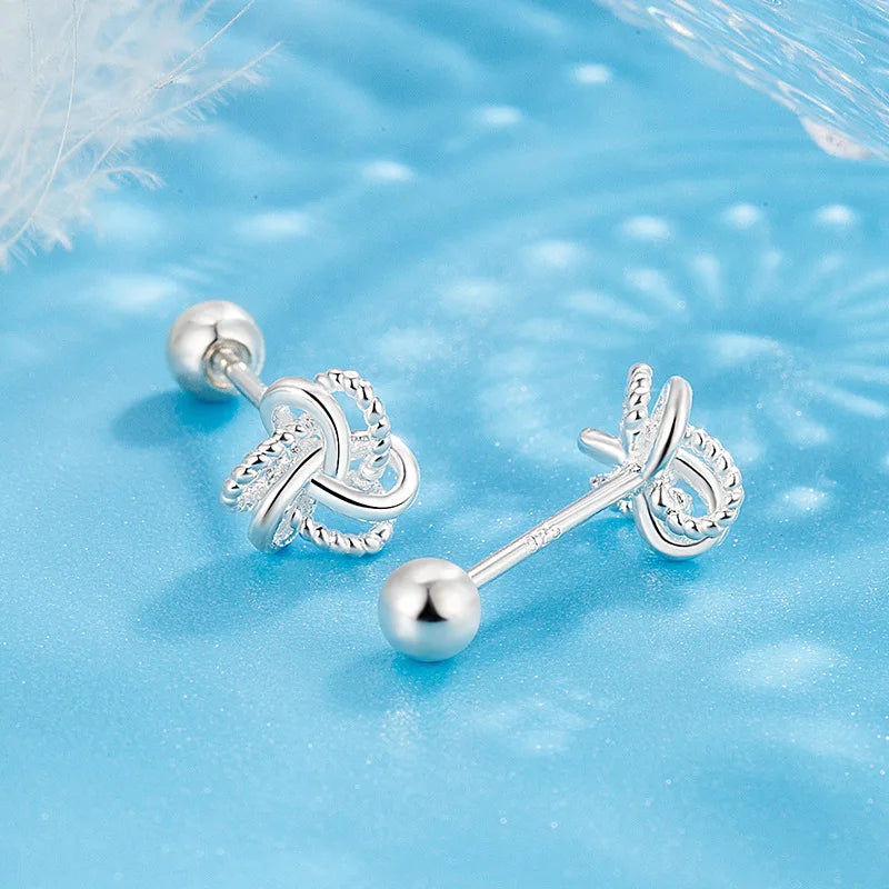 The S925 sterling silver stud earrings symbolize peace and good luck, representing high-end jewelry and a luxurious retro style