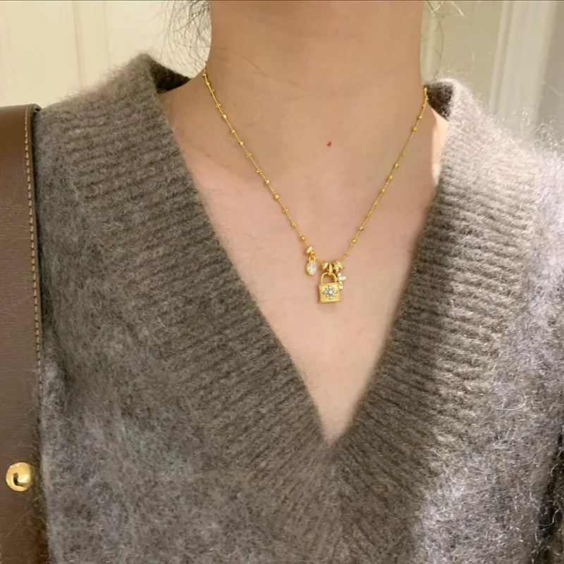Lace craft running ring cross pendant lock bag necklace luxury premium feel collarbone chain niche new sweater chain